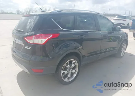 2015 Ford Escape Titanium z USA, uszkodzony, nr VIN 1FMCU0JXXFUC88118